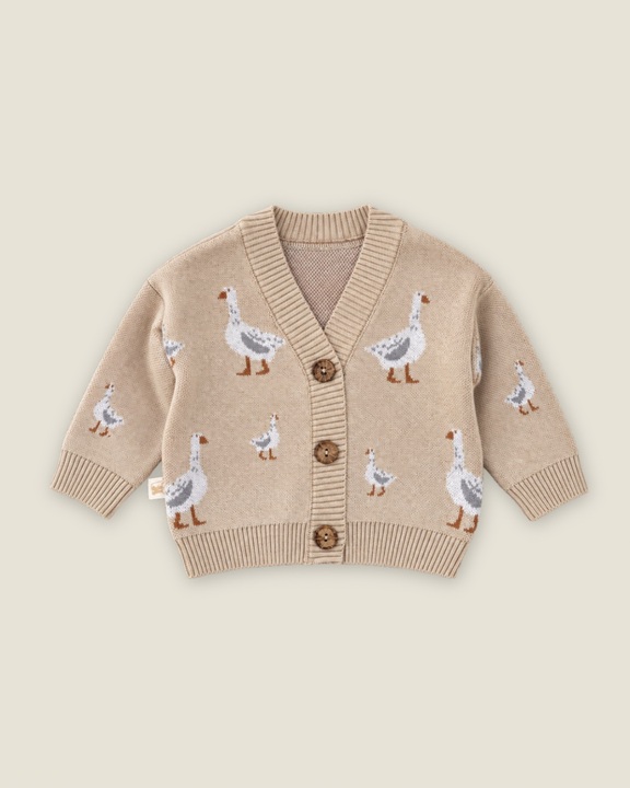 Goose knitted children's cardigan. New collection 