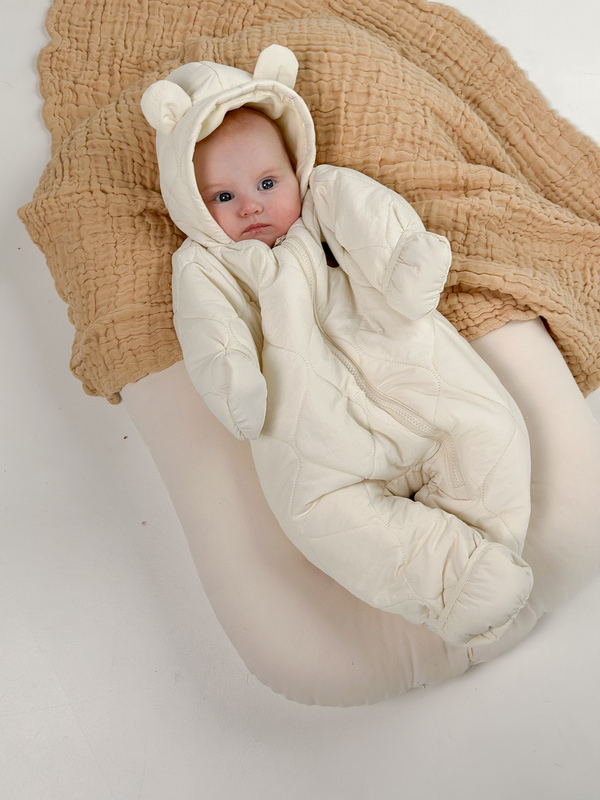 Demi-season jumpsuit made of quilted raincoat Milk. New collection 