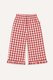 Light trousers with ruffles made from boiled red butter. New collection 
