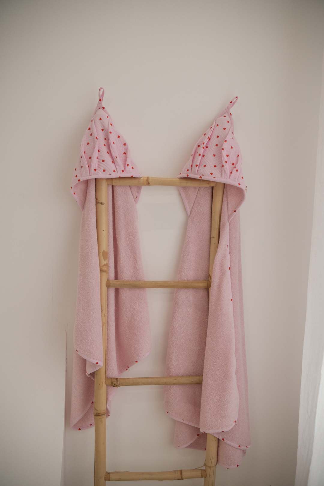 Hooded towel 110x110 Pink hearts made of cotton terry 