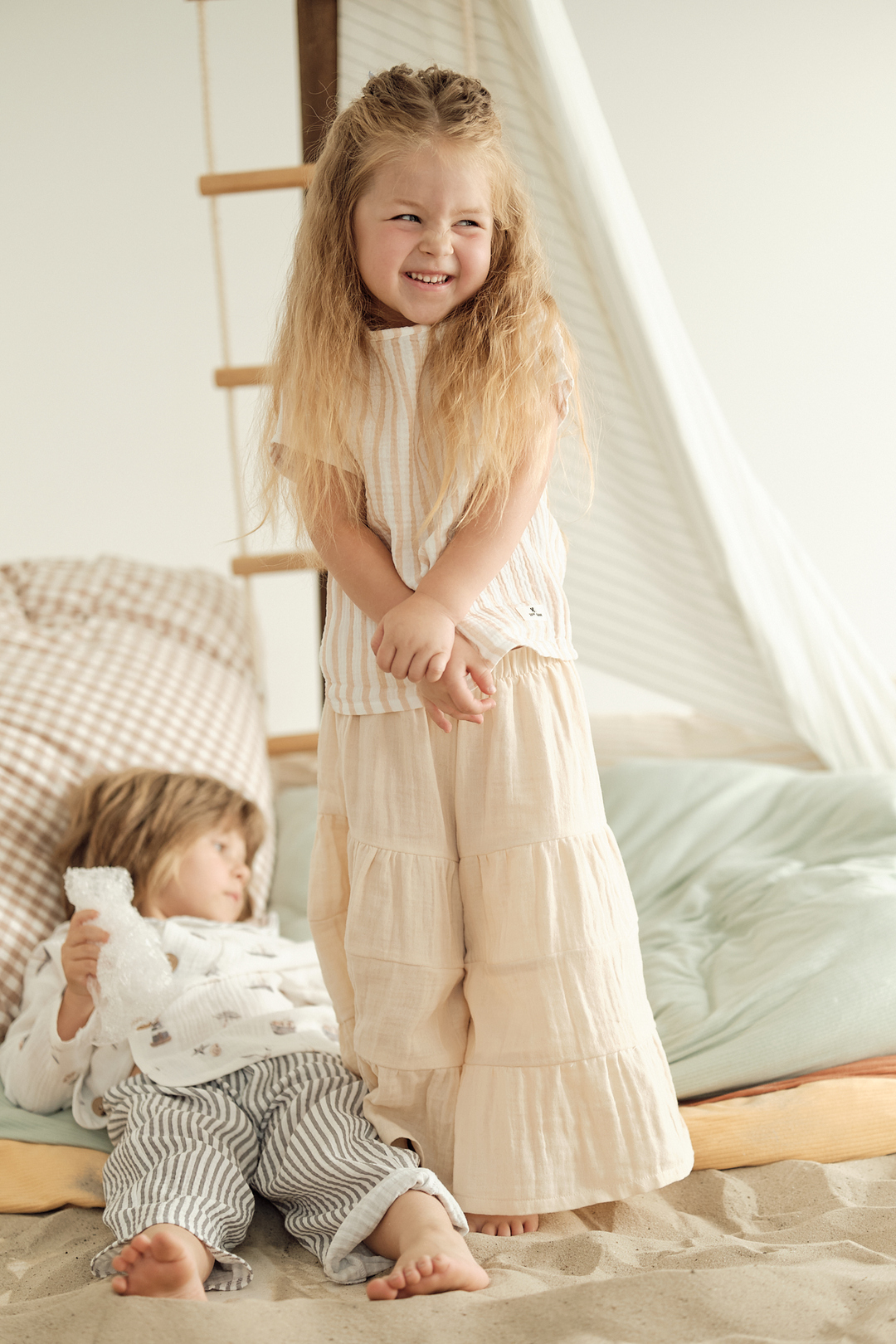 Beige muslin flared pants. New collection 